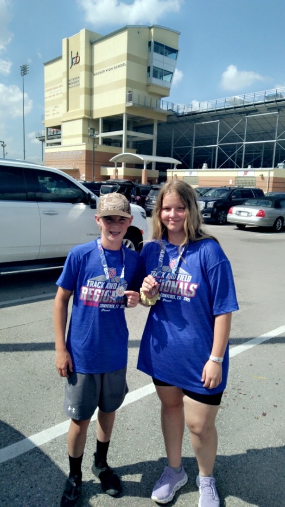 Brice & Allie with their medals! 